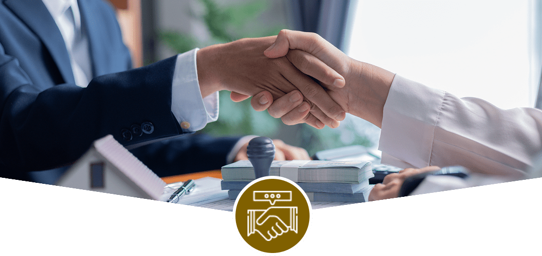 Two people shaking hands professionally