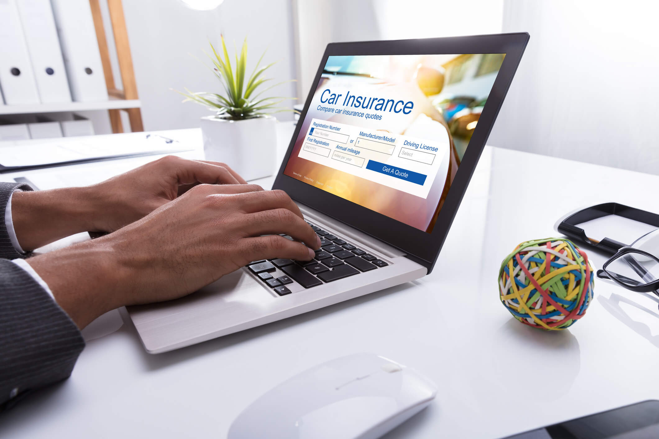 Online insurance options displayed on laptop